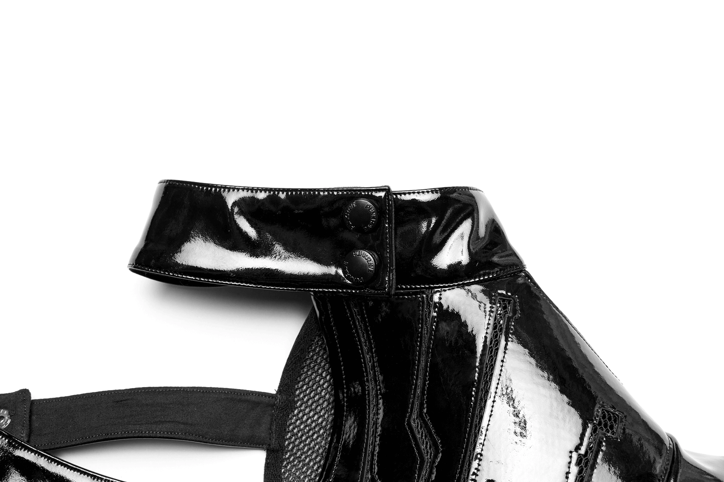 Side close-up detail of gothic harness collar assembly with dual snap button fasteners in patent leather material