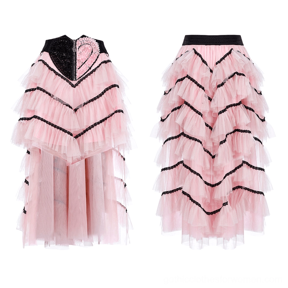 High-low asymmetric pink mesh heart skirt showing sheer tulle back panel, heart appliqué detail, and black trim accents in studio photography