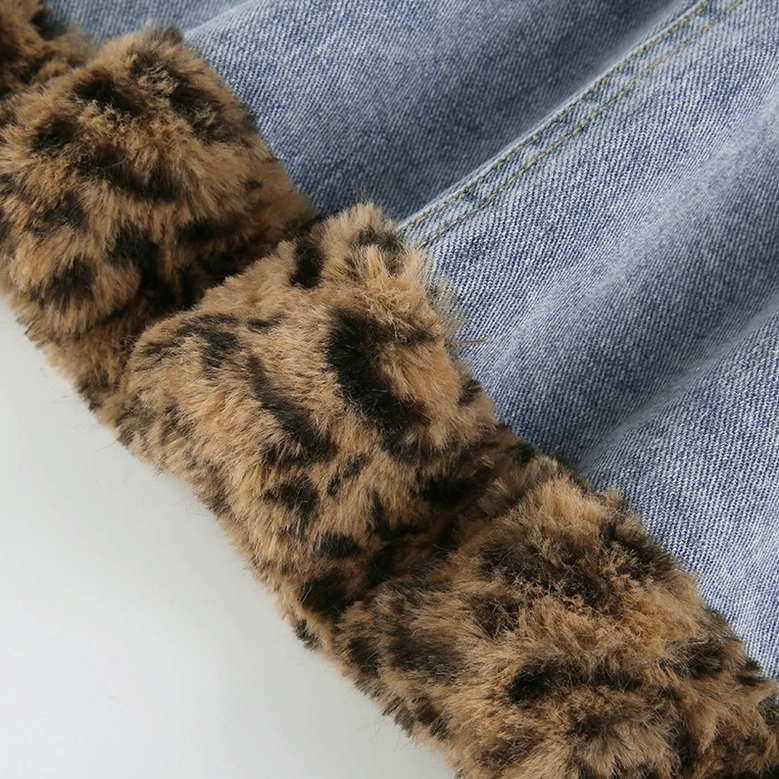 High-waist denim mini skirt worn model full body, fuzzy leopard trim styling
