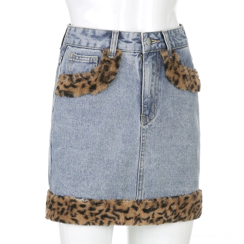 High-waisted denim mini skirt flat lay front showcasing fuzzy leopard print accents