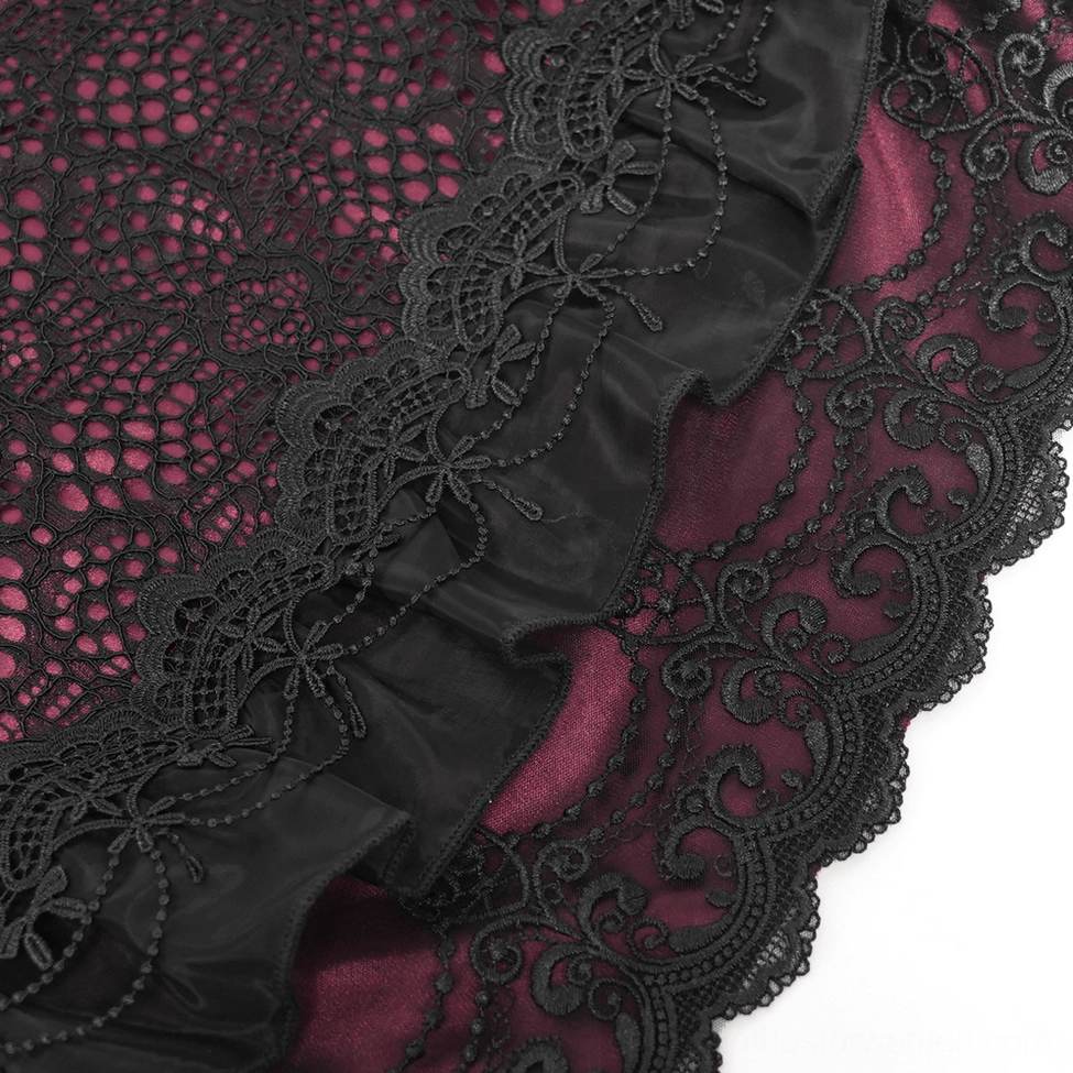 High-waisted gothic lace skirt with ornate belt and draped black lace emphasizing Victorian silhouette