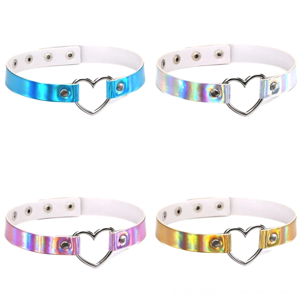 Four holographic heart chokers arranged in top view showing all color options - Blue, Gold, Pink, White with iridescent finishes
