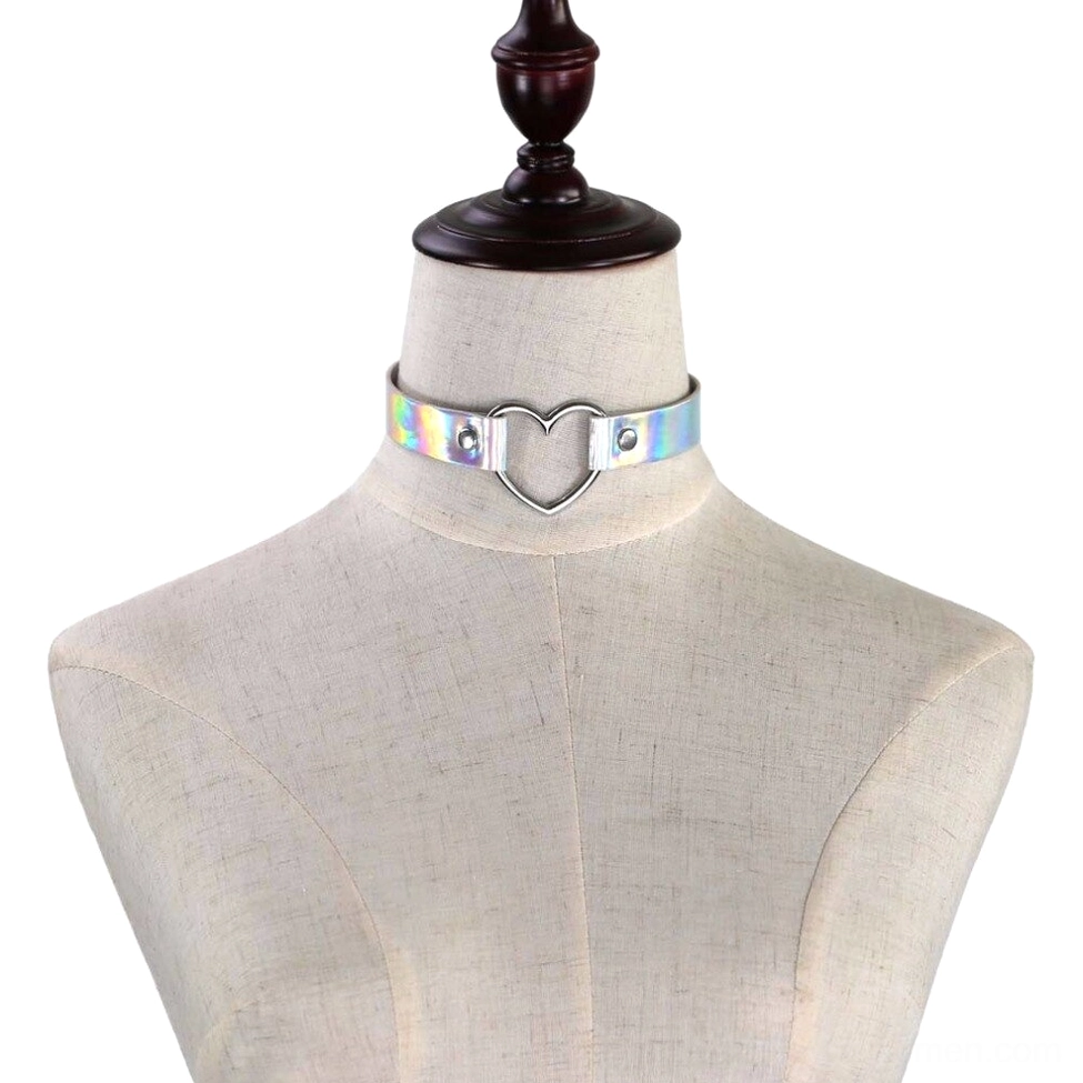 Silver holographic heart choker displayed on dress form mannequin showing proper neck fit and positioning with metal heart buckle