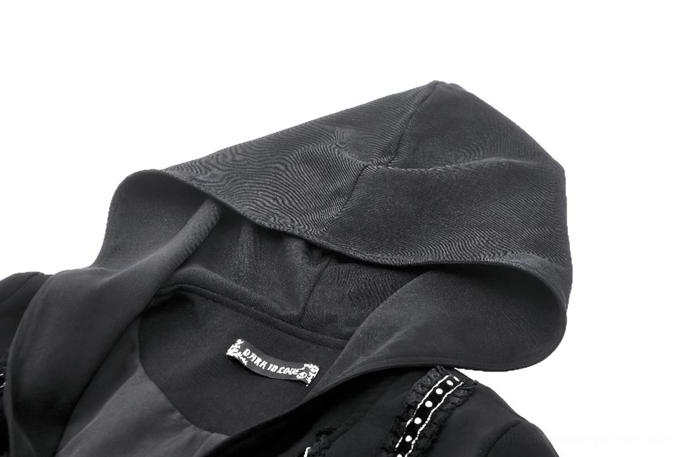 Close-up detail of gothic coat hood lining and decorative lace edge trim