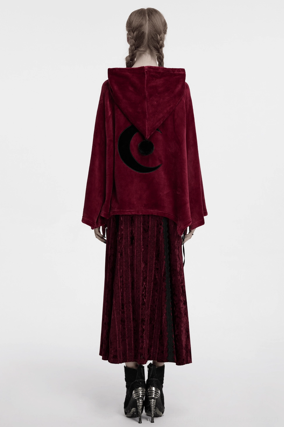 Side angle of wine red hooded cape showing cape length, drape quality, and loose silhouette