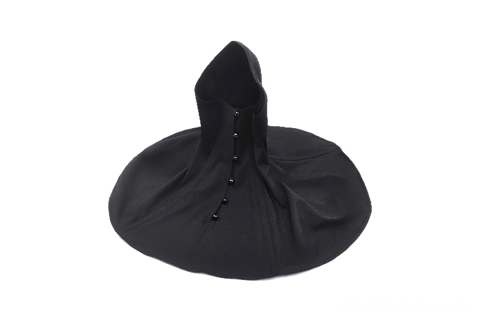Standing black hooded cape side angle view showing draped structured silhouette and button front closure