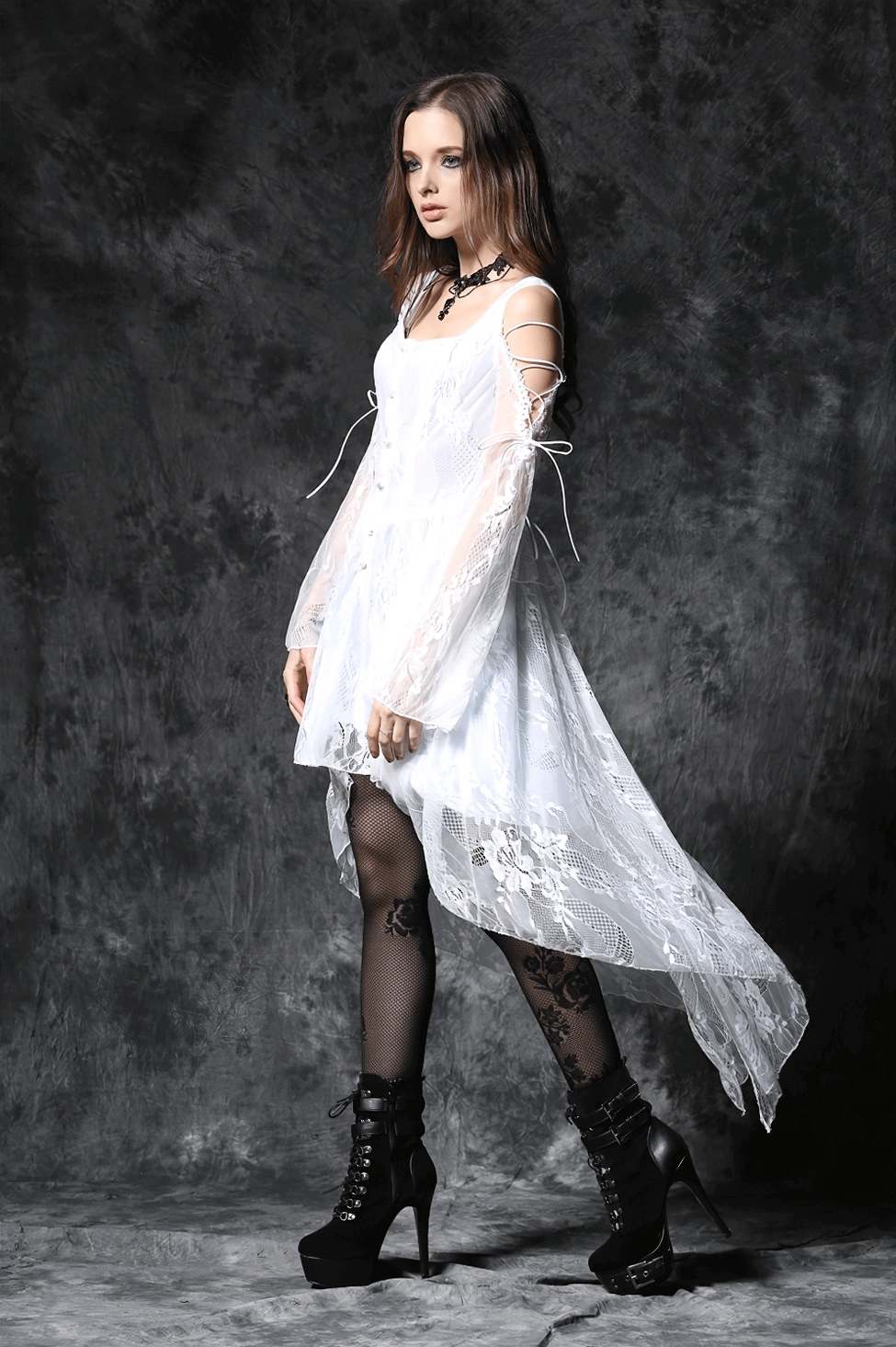 Ivory gothic high-low lace dress with floral lace pattern and stiletto heel styling