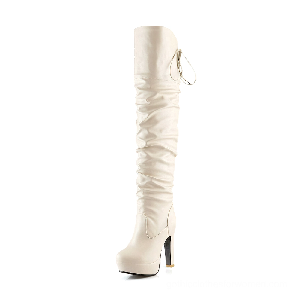 Off-white ivory gothic over-the-knee platform boot with back lace-up closure and ruched shaft, side view