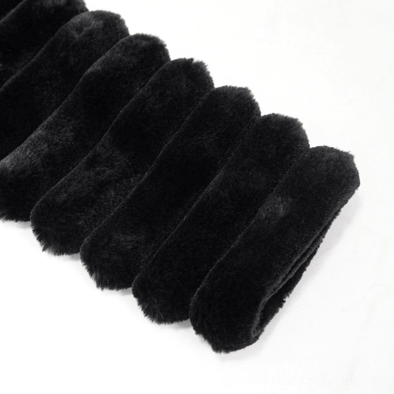 Flat lay close-up of fuzzy stacked ruched cuff detail on black gothic cat ear hooded jacket