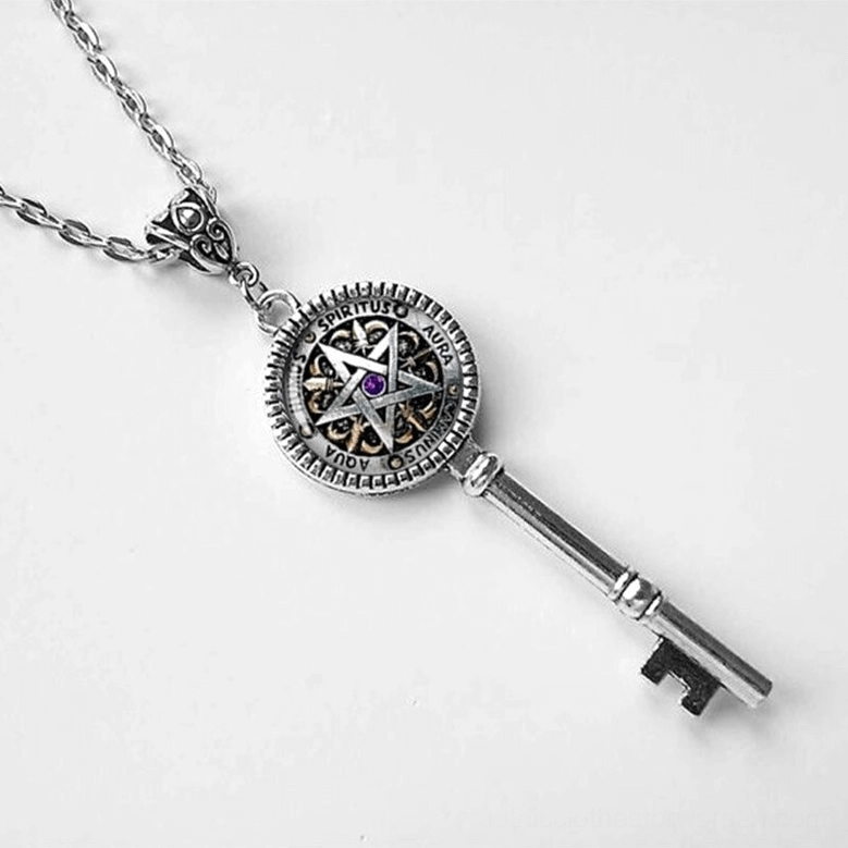 Key of Solomon pentagram pendant silver-tone with twisted chain detail and purple gem center, overhead angle view – gothic occult necklace