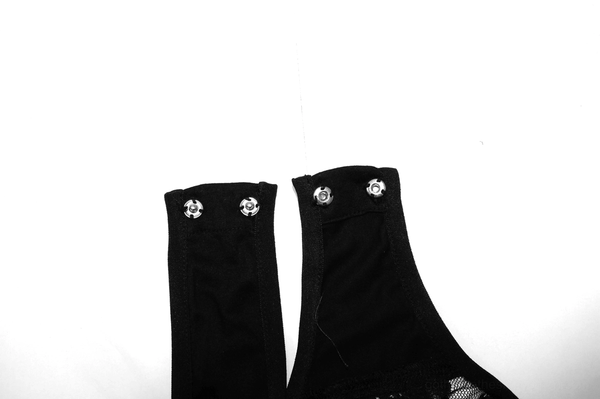 Shoulder straps with metal snap fasteners for black gothic lace bodysuit close-up detail