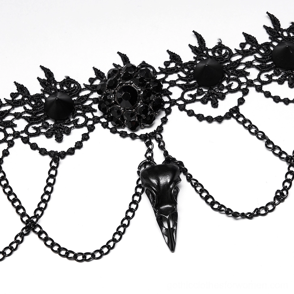 Close-up detail of Victorian gothic lace choker featuring floral motifs and black resin gems