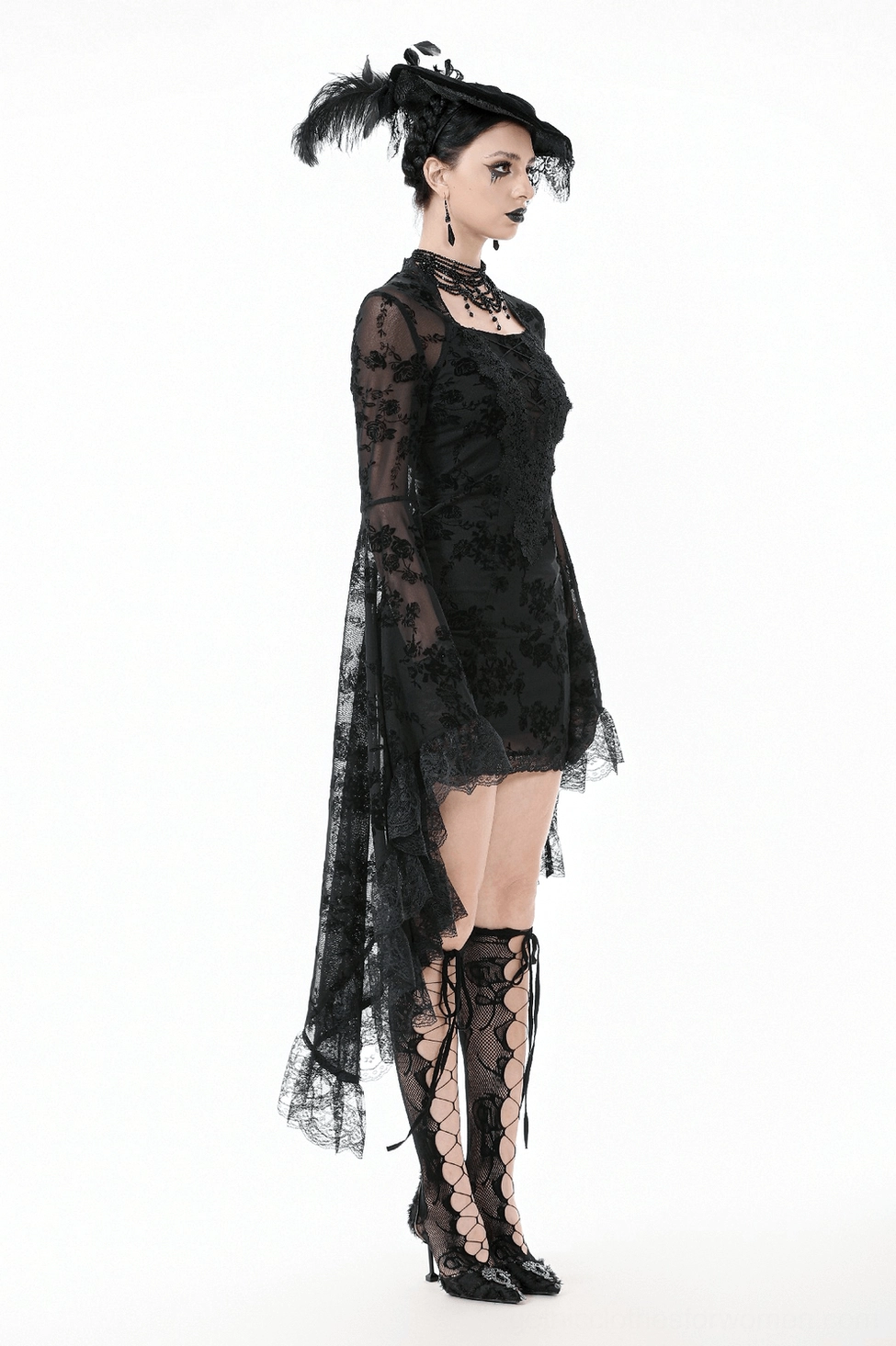 Black lace mini dress showing layered lace cuffs and bell sleeve construction