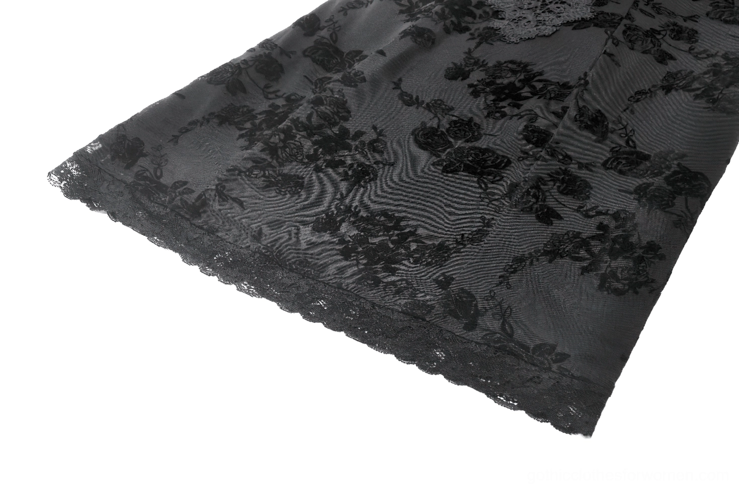 Black floral lace dress showing bell sleeve and shoulder construction detail