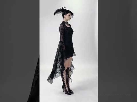 Black gothic lace mini dress side view with styled goth accessories and high-low hem