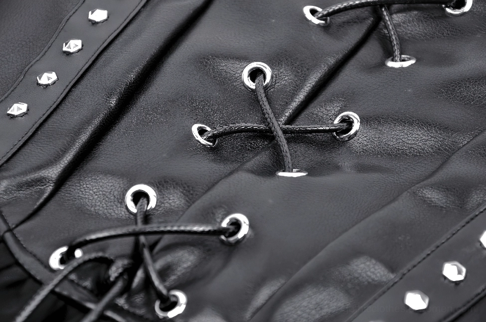 Macro close-up of lace-up fasteners on gothic corset skirt with metal eyelets and black lace cord