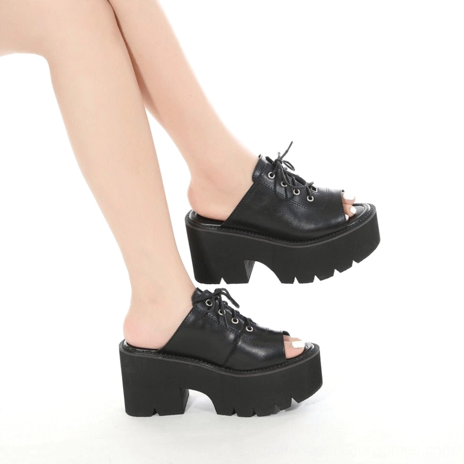 Alternative angle of platform mule sandal highlighting lace-up system and industrial design