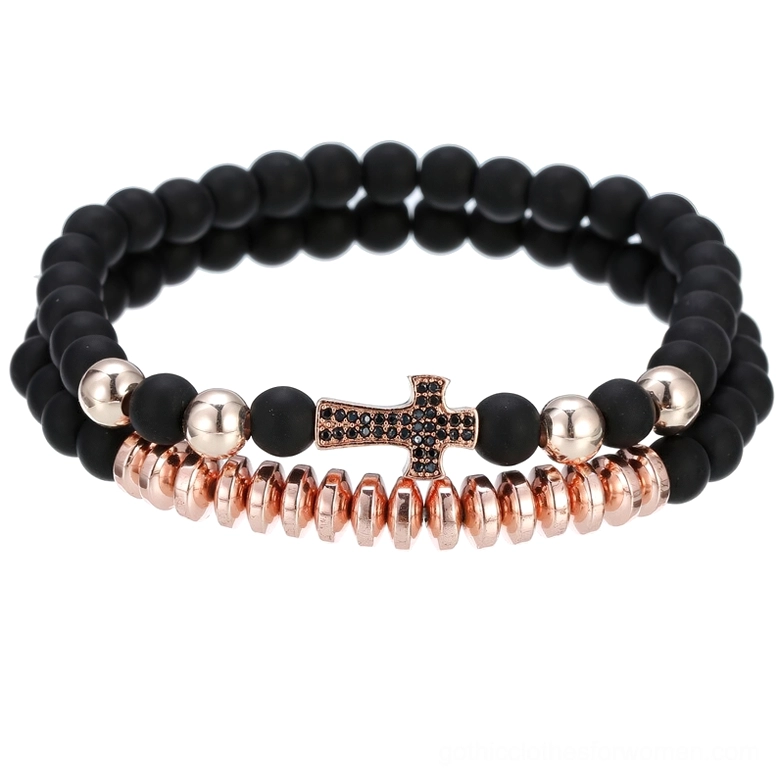 Rose gold lava stone cross bracelet with warm metallic accents and natural volcanic stone beads
