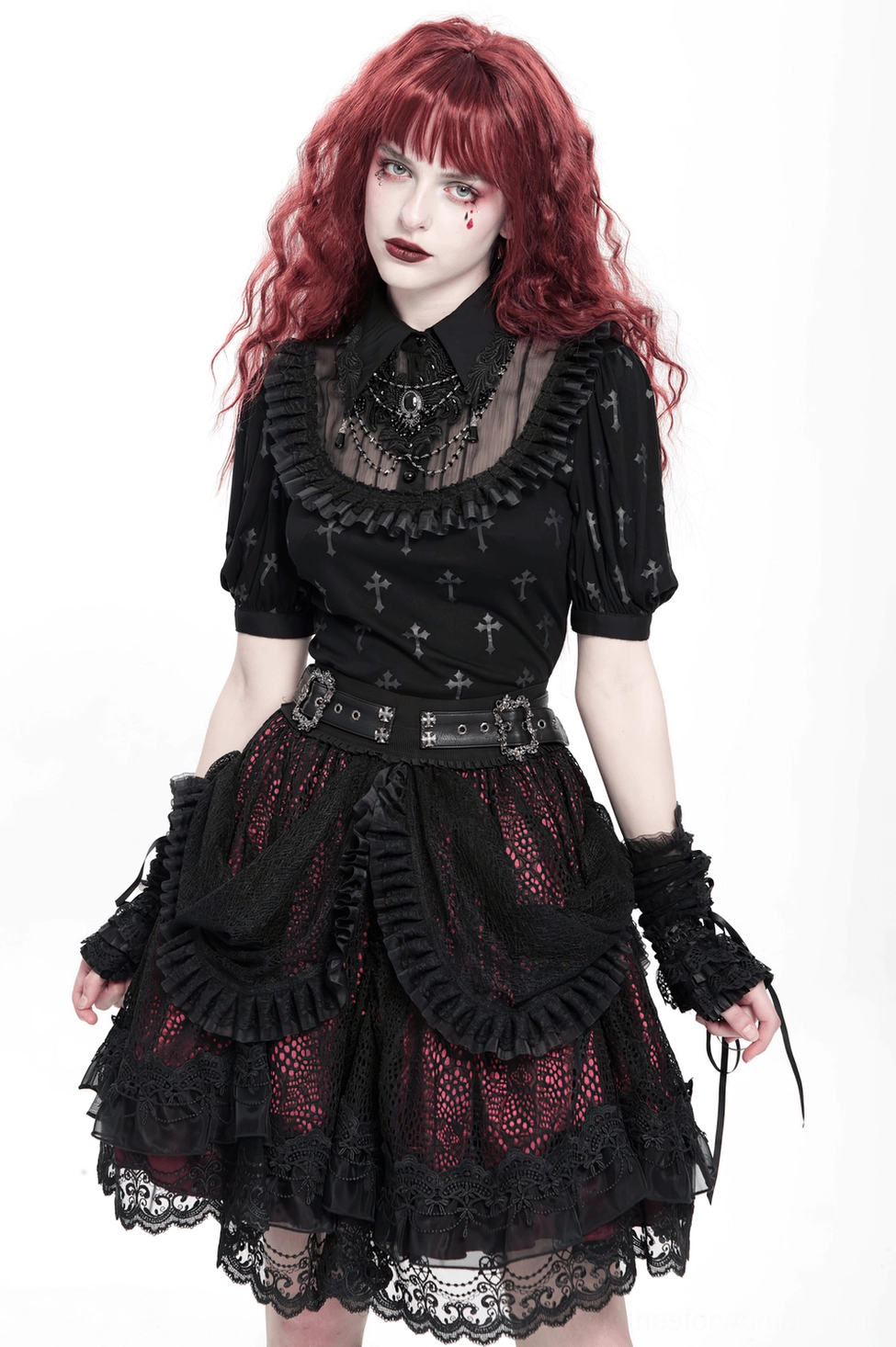 Full view of layered black lace gothic skirt with metal-adorned belt and cascading ruffles