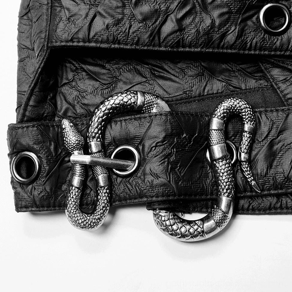 Close-up of snake-shaped python metal buckle hardware and heavy-duty leather straps on gothic harness