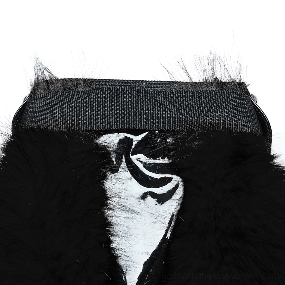 Close-up side view of gothic leg warmer inner construction, showing black faux fur exterior contrasting with printed fabric interior lining