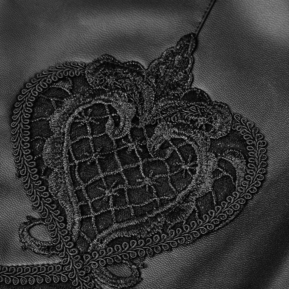 Close-up of black leggings drawstring waist with braided knot detail and hidden elastic