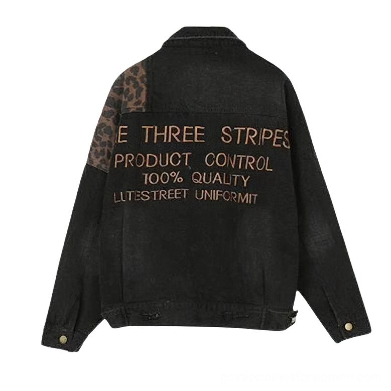 Gothic denim jacket back view flat lay, displaying full back embroidery slogan and leopard shoulder patches
