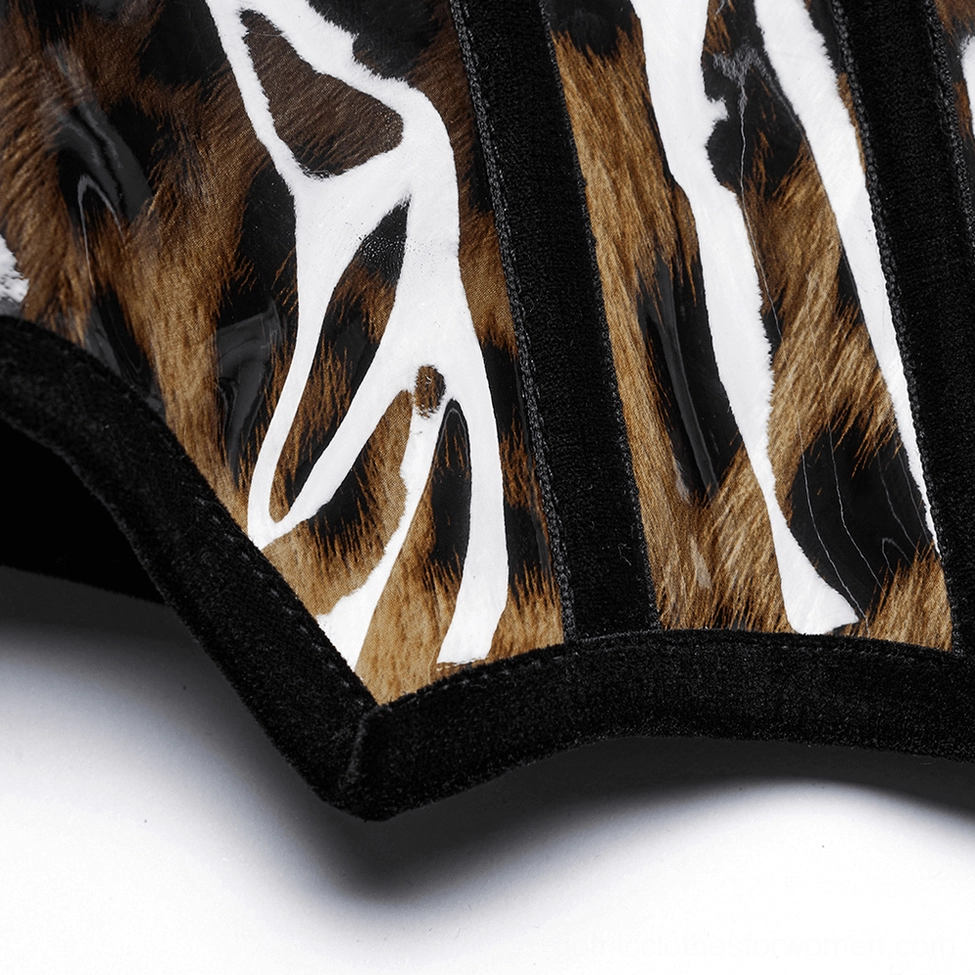 Leopard print patent leather gothic corset close-up of hem showing black velvet edge trim and precision stitching