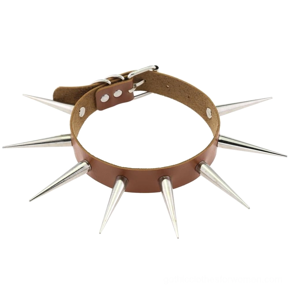 Light brown leather gothic choker necklace with silver metal spikes arranged flat on white background front display