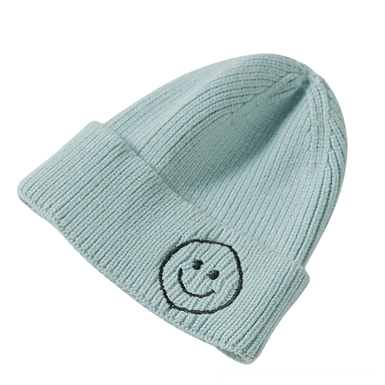 Light mint blue smiley face knit beanie with black embroidered smiley, soft gothic winter hat