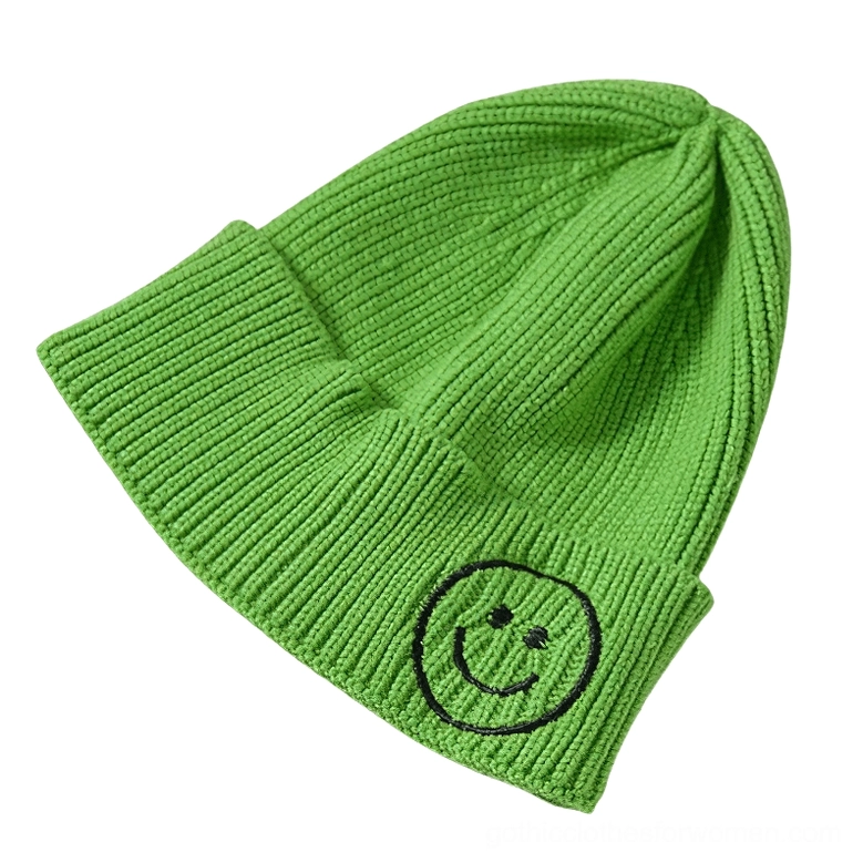 Bright lime green smiley face knit beanie with black embroidered smiley, alternative dark aesthetic hat