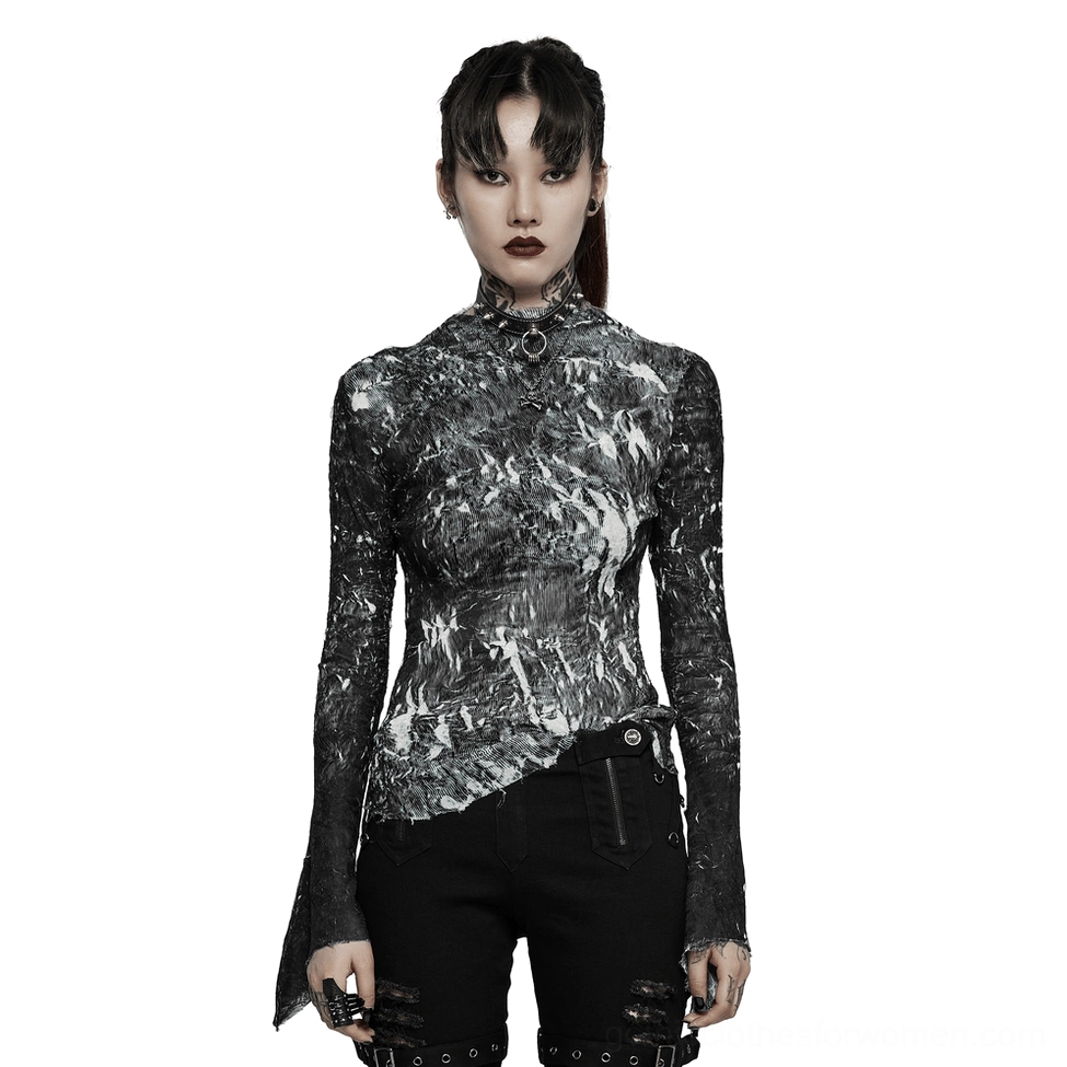 Front full-body view of abstract marble gothic fitted long-sleeve top worn by punk-style model with asymmetric hemline and flared split cuffs on white background