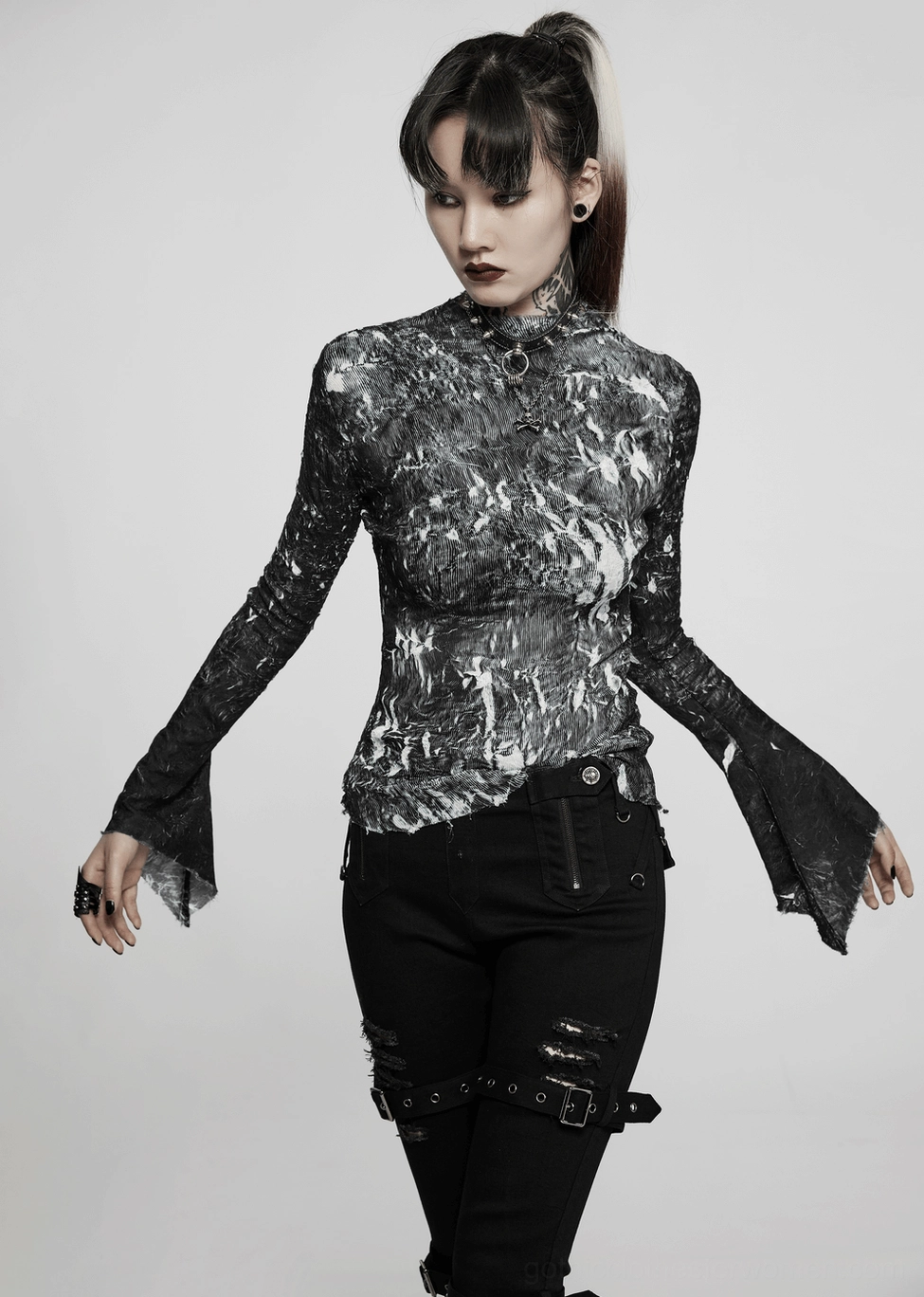 Full product presentation of black-white marble gothic fitted top with split sleeves flared cuffs and slim silhouette