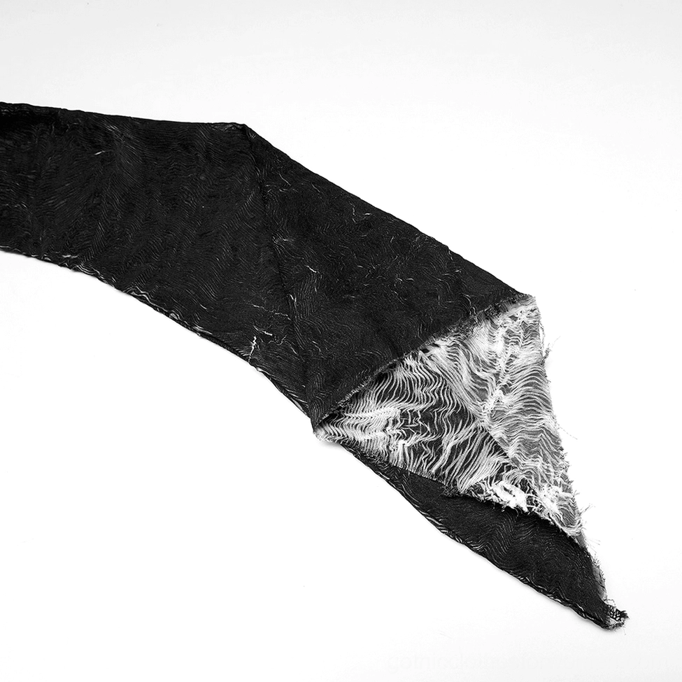 Close-up side view of irregular split cuff edge with frayed fabric detail and asymmetric hem design of gothic fitted top