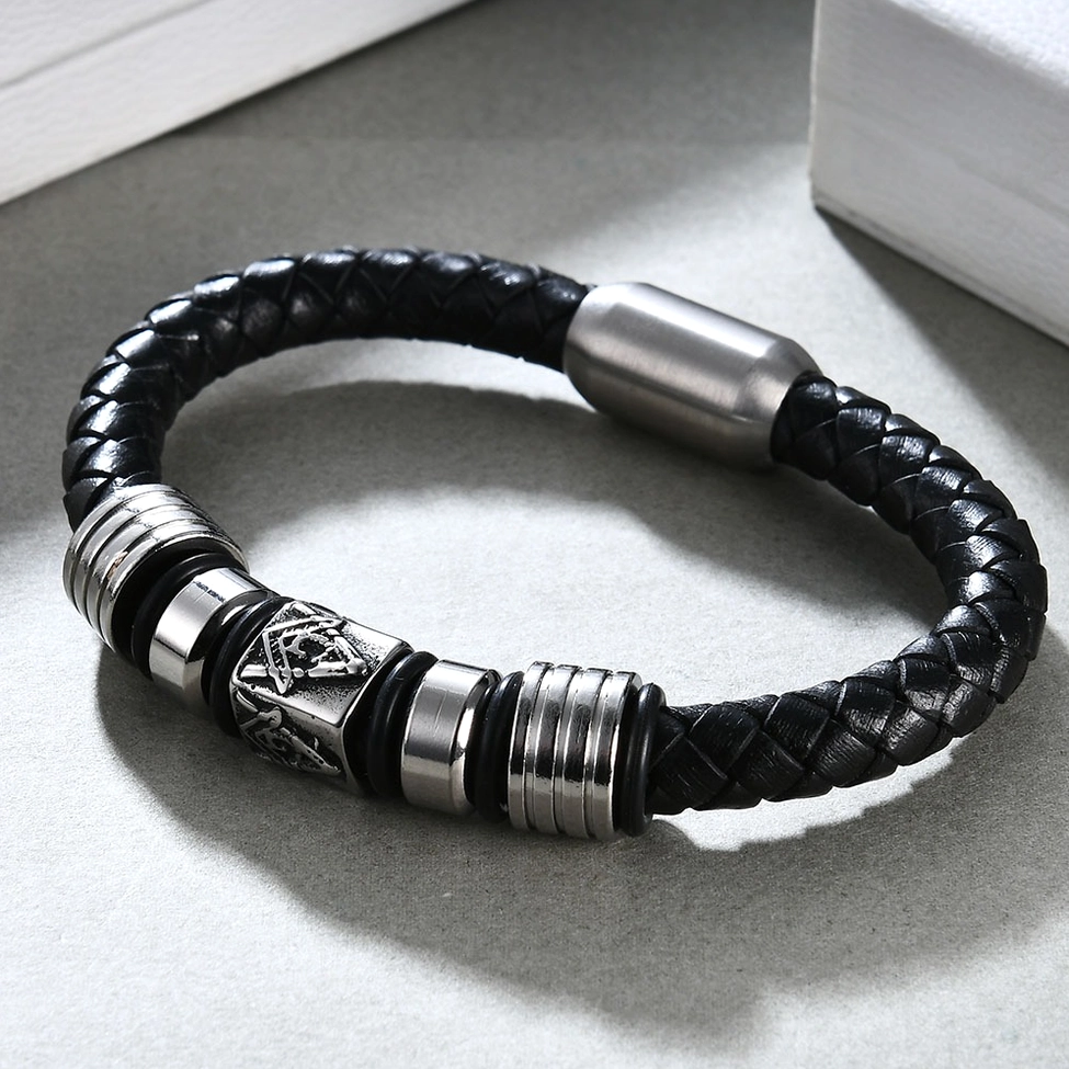 Top oblique view of black leather Masonic bracelet with Masonic emblem and magnetic steel clasp detail