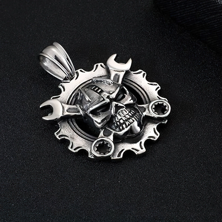 Stainless steel mechanical skull necklace on black background - matte vintage finish punk gothic pendant