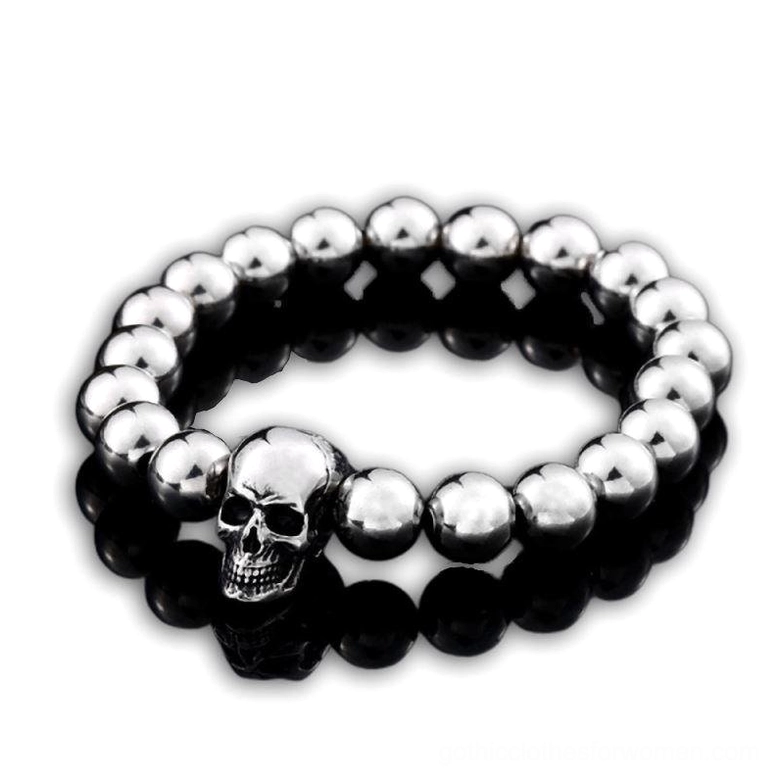Memento Mori skull beaded bracelet flat lay - stainless steel gothic jewelry with 3D skull charm and round metal beads