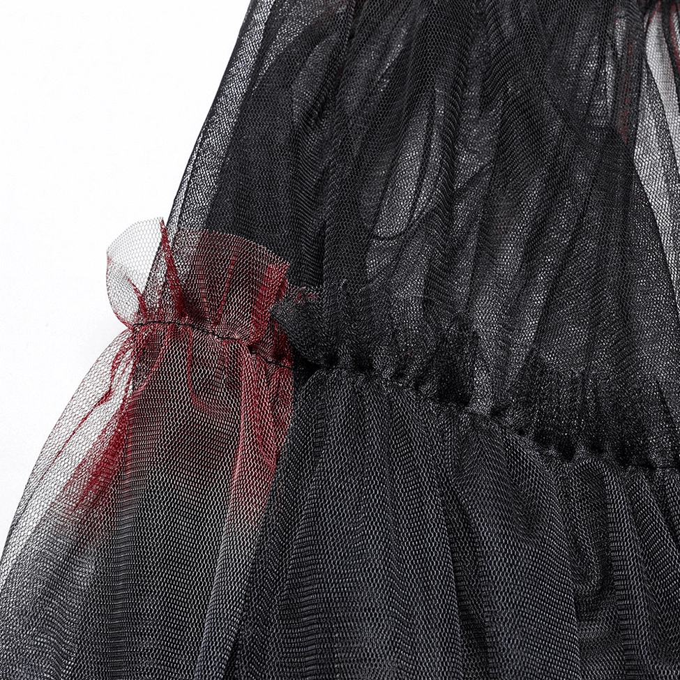 Sheer red-black mesh tulle fabric close-up detail showcasing soft texture and ombre gradient