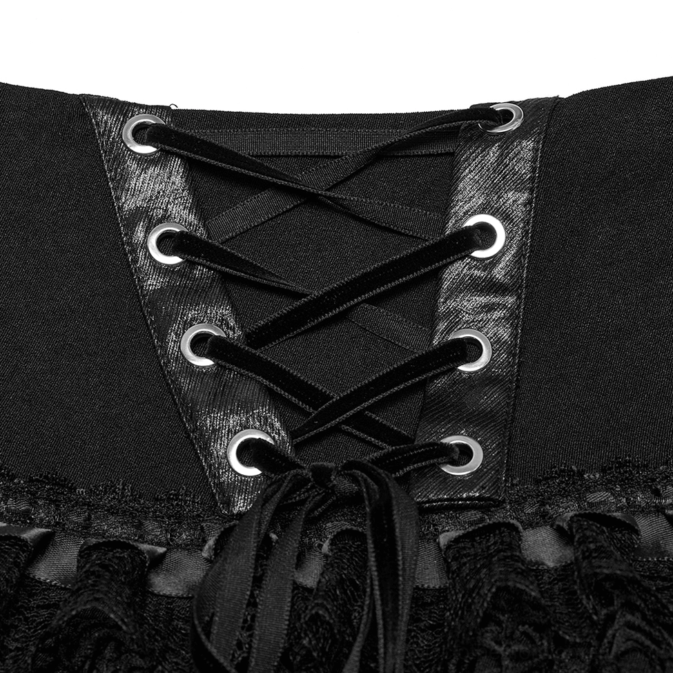 Metal eyelet lace-up closure detail of black gothic mini skirt with velvet corset-style lacing strap, close-up front view