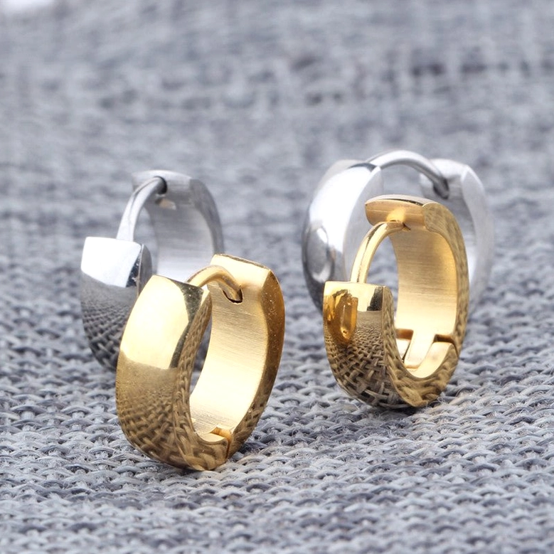 Mixed finish stainless steel round stud earrings in silver and gold tones, gothic unisex alternative jewelry collection