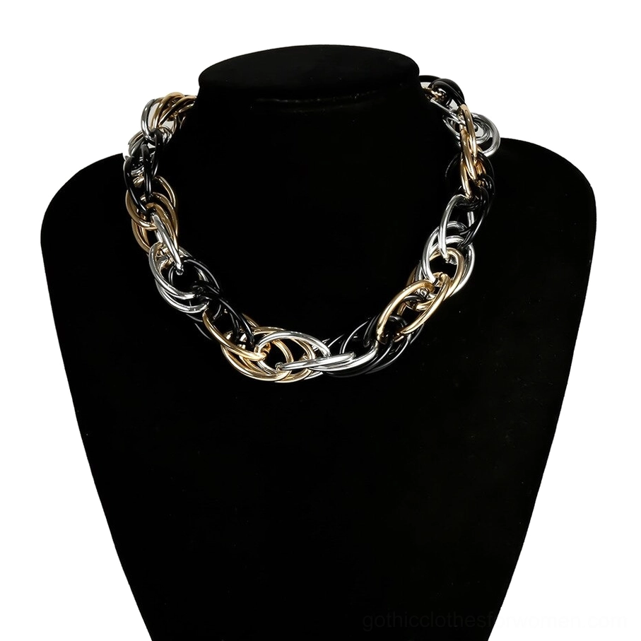 Mixed tri-tone black gold silver twisted chain necklace on black mannequin, gothic choker style