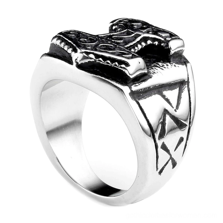 Viking signet ring featuring Thor's hammer Mjolnir crown with detailed rune engravings on the band, front perspective