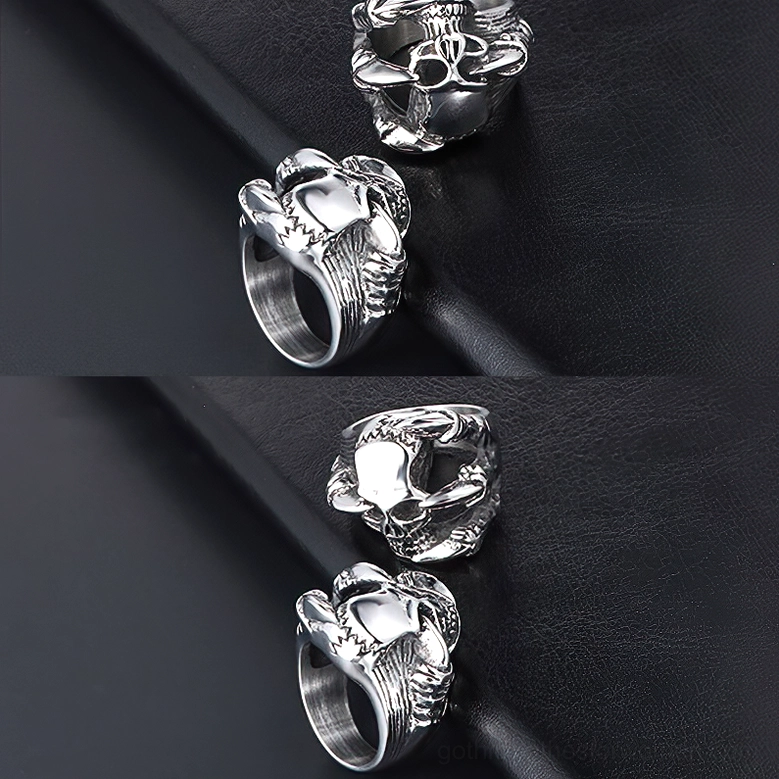 Multiple gothic skull rings flat lay display showing different angles and perspectives