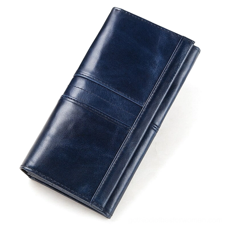 Navy blue genuine leather long wallet clutch with glossy finish and horizontal stripe stitching, studio photography on white