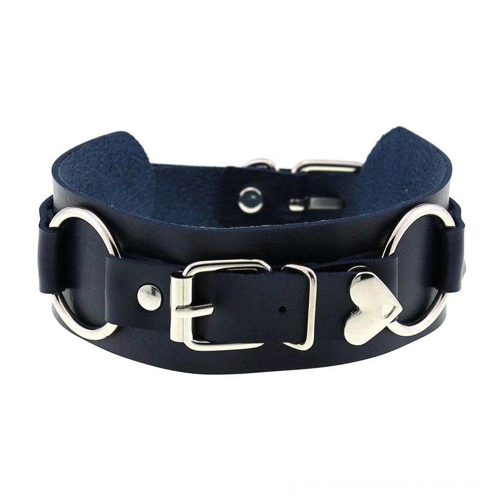 Navy blue leather choker with bright silver hardware and prominent heart charm embellishment