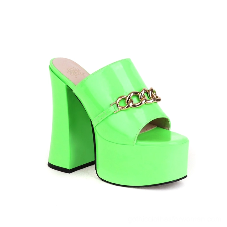 Neon green patent leather gothic chain platform slide heels with glossy finish and gold chain embellishment