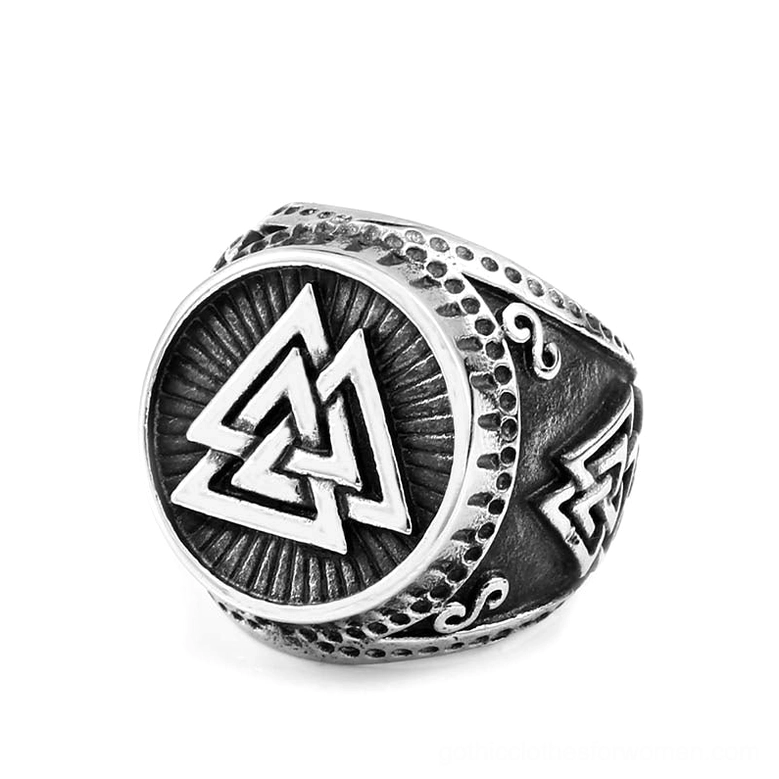 Nordic amulet ring side three-quarter view dotted border swirling knotwork decoration stainless steel