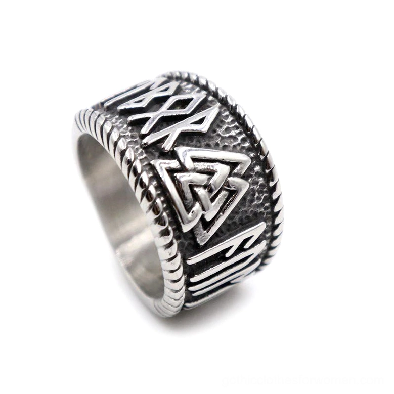 Nordic rune stainless steel ring right side perspective showing twisted rope border, hammered texture, and Valknut carvings with antique finish