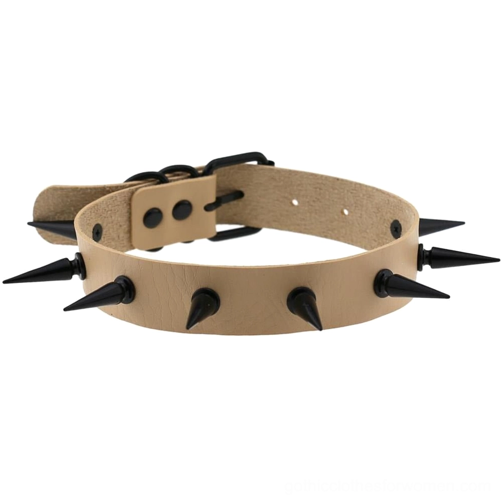 Nude beige spiked choker collar with black iron studs and adjustable leather strap