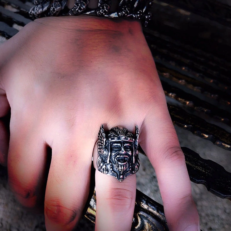Odin Head Ring Side View on Finger - Dark Metal Background Stainless Steel Details